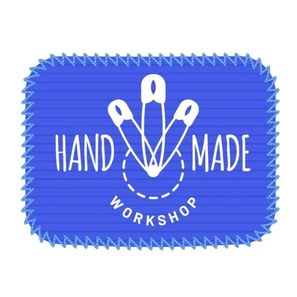 handmade workshop logo with safety pins blue